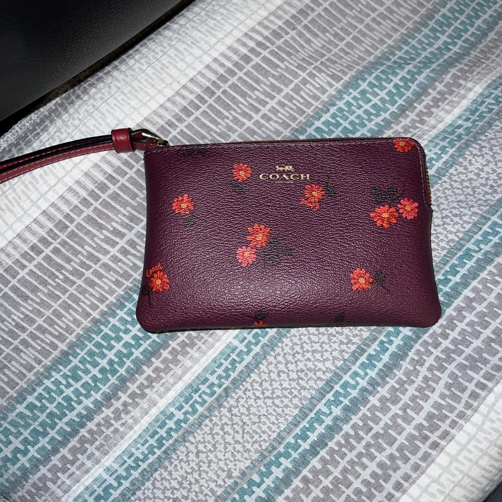 Coach Corner Wristlet! Burgundy with Country flowers.